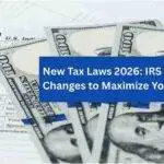 U.S. 1040 tax form with several $100 bills spread across it, overlaid with a blue text box reading “New Tax Laws 2026: IRS Tax Changes to Maximize Your Refund.