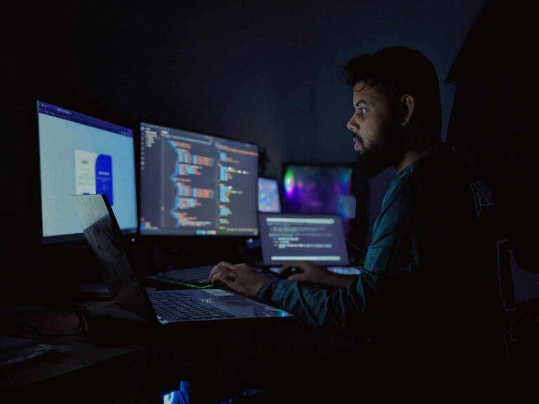IT professional working on a secure cloud system at night with code overlays, illustrating how Citrix improves performance and eliminates RDP lag for hosting Accounting CS in CPA firms.