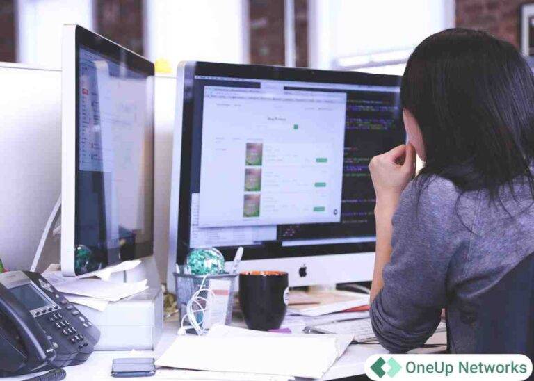 Accounting professional working at a desktop computer experiencing performance issues in a shared RDP environment.