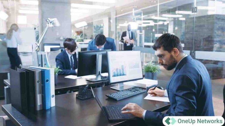 Accounting professionals working in a modern office using cloud remote desktop solutions, representing CPA firms transitioning from RDP to Citrix for reliable performance.