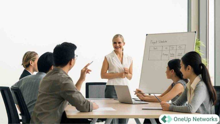 Accounting team discussing cloud hosting cost audit results during a meeting, with a presenter explaining line-items on a whiteboard.