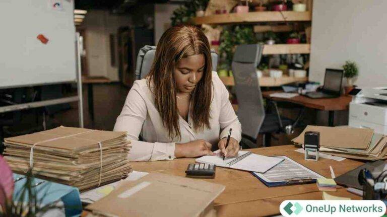 finance professional handling accounting documents and secure cloud workflows