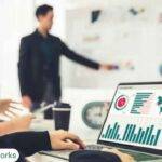 CPA team reviewing Outlook performance and sync reports on a laptop