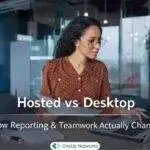 Professional woman reviewing documents on a laptop with Hosted vs Desktop and reporting teamwork comparison text overlay in a modern office