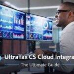 Professional working on dual monitors with UltraTax CS Cloud Integration title overlay in a modern office environment